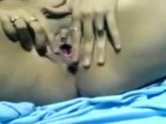 My lustful married slut enjoys making fun of her pink fur pie.